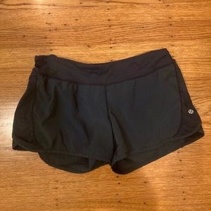 BLACK LULULEMON SHORTS, Size 6
